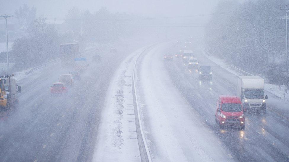 Motorists drove through heavy snowfall on the M5 near Taunton, Somerset