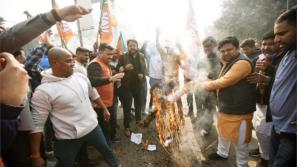 Protesters in Patna burn an effigy of Bihar Education Minister Chandrasekhar for his comments on Ramcharitmanas in January