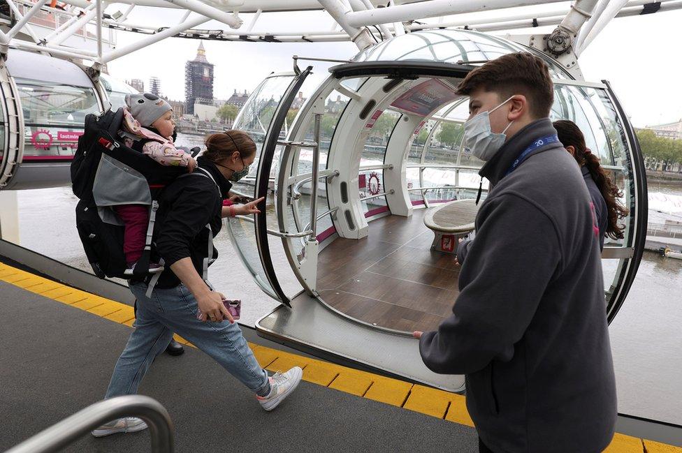 Passengers board the London Eye