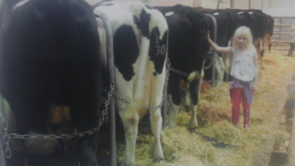 Mr Grooms' daughter, Beca, at the family farm in 2011