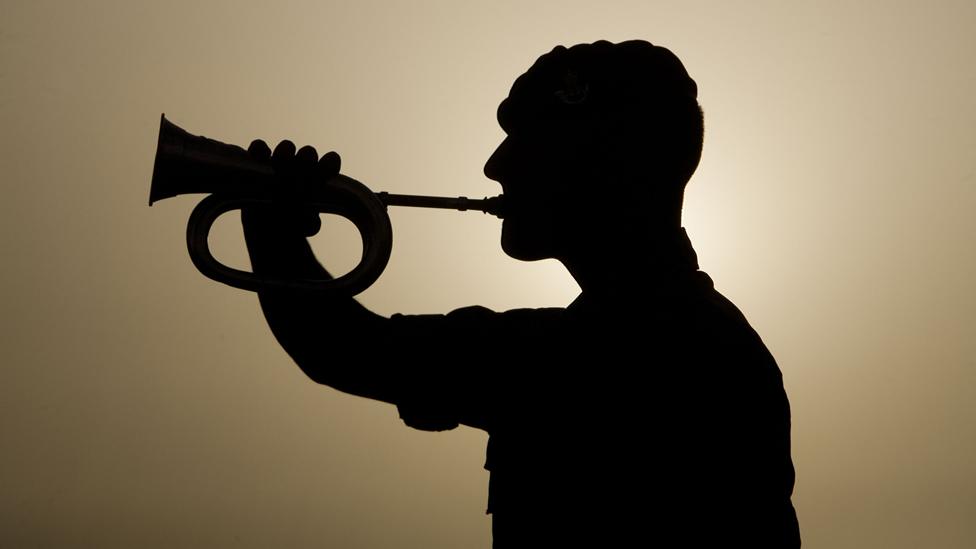 Bugler Michael Ashcroft of 2 platoon, A Company, 5 Rifles in FOB Oxford practising in Basra in 2009, prior to a memorial service marking the final day of combat operations in Iraq for British forces.