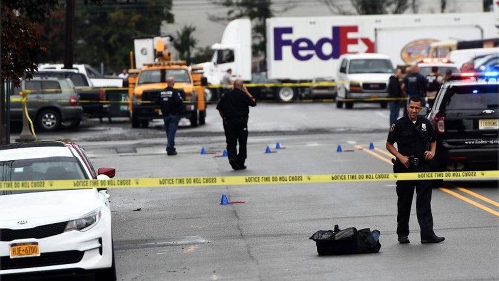 Police officers in the area where suspect was arrested in Linden, New Jersey