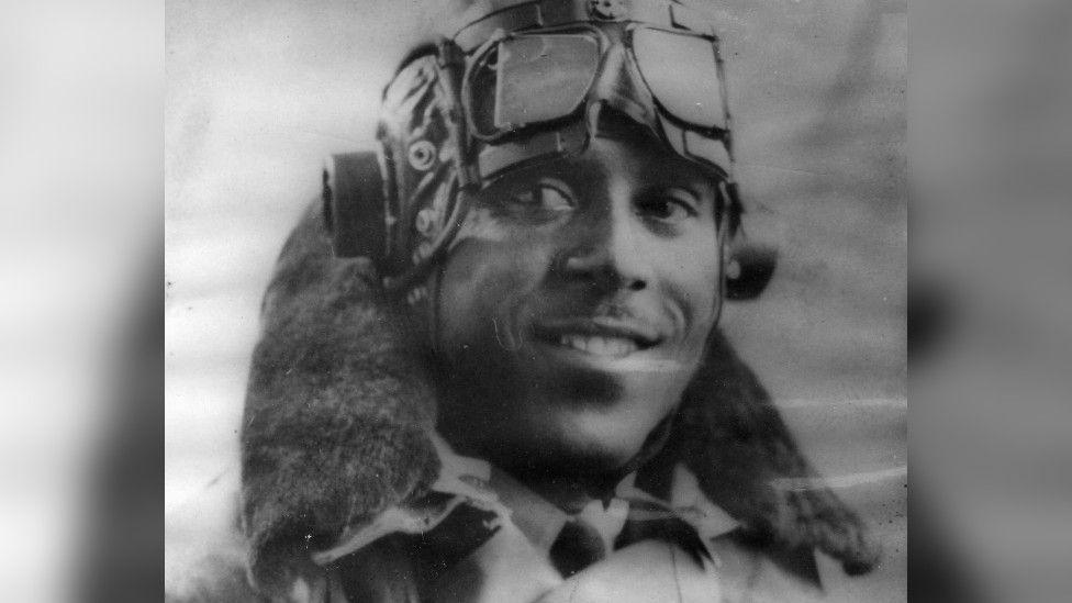 Black and white picture of John Henry Smythe in an RAF bomber command flying jacket.