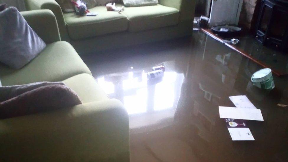 Flooding inside Beth Moore's cottage