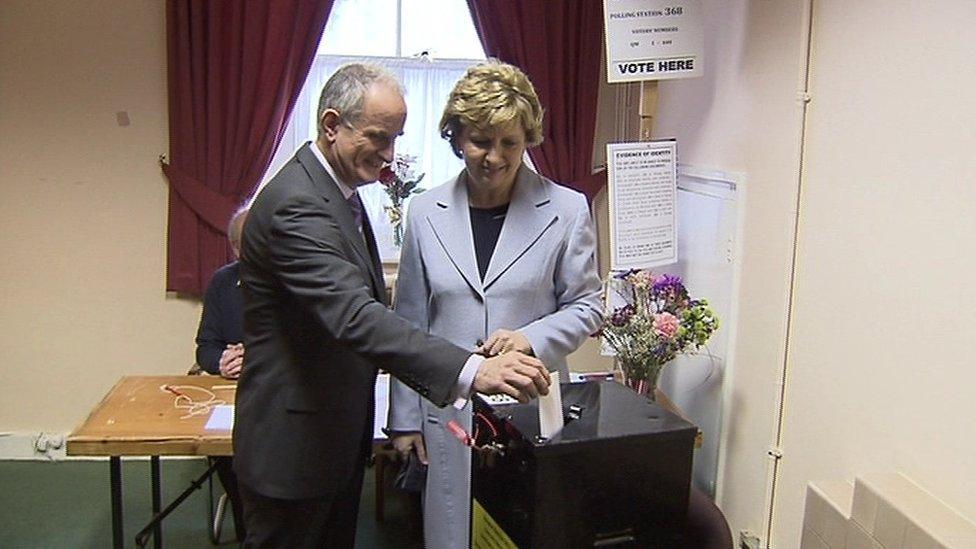 Former Irish president Mary McAleese casts her vote with her husband