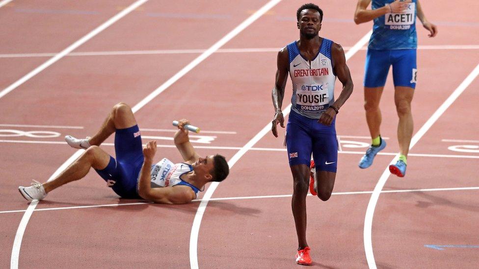 Rabah Yousif and Toby Harries running in the 4x400m relay final at the 2019 World Athletics Championships.