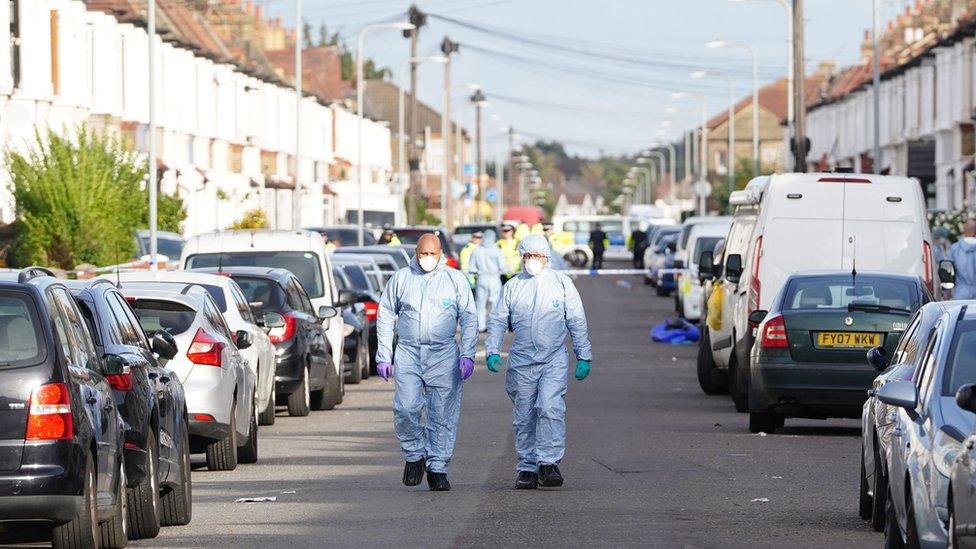 Forensics officers at the scene in Ilford