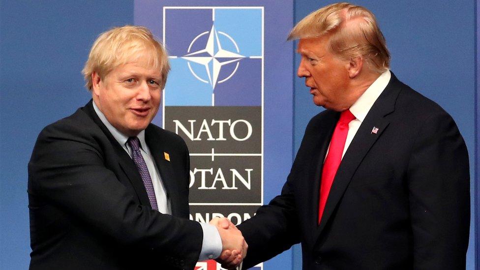 UK Prime Minister Boris Johnson shakes hands with US President Donald Trump during the annual Nato heads of government summit in Watford, England, 4 December 2019