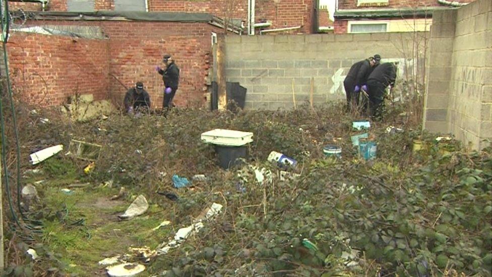 Police officers conduct the search in an near close to the last sighting of Naheed Khan