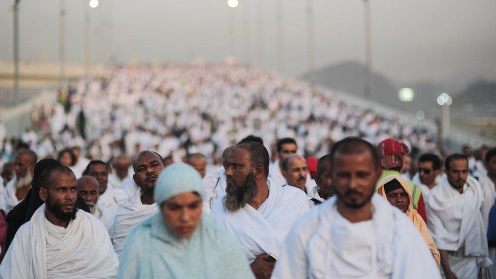 Hundreds of thousands of Muslim pilgrims make their way to cast stones at a pillar symbolizing the stoning of Satan