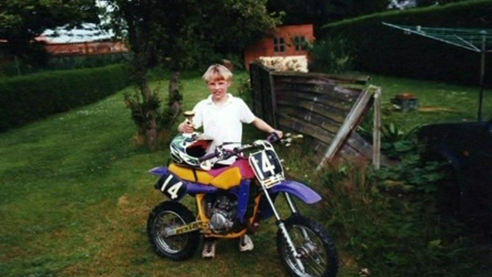 Mike Booth as a child with bike