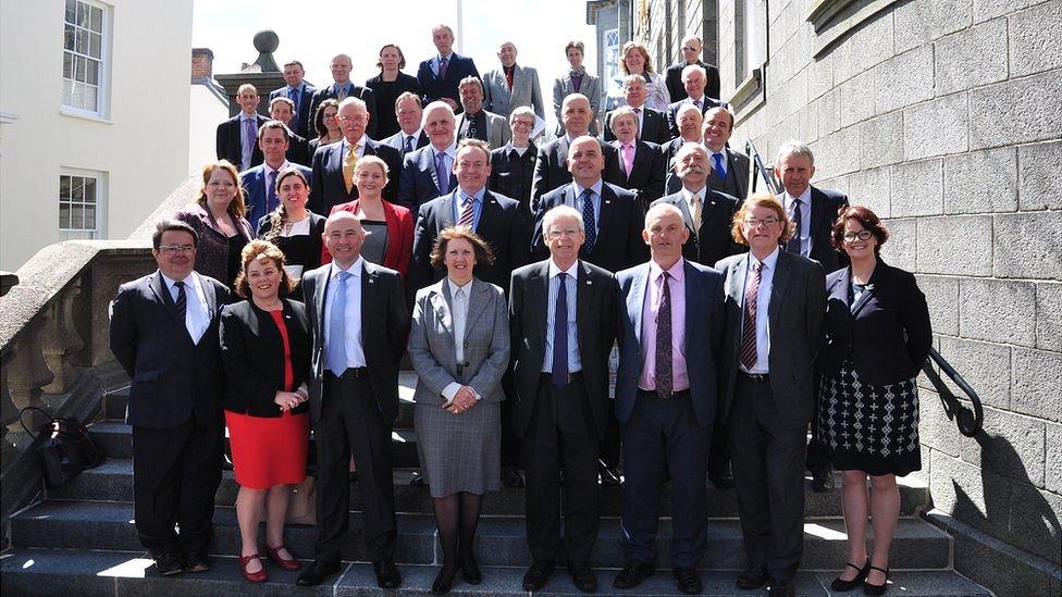 The 38 successful Guernsey election candidates on the steps of the States building