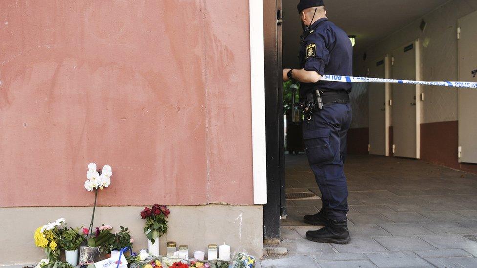 A policeman working at the site where Eric Torell was shot by police on August 3, 2018