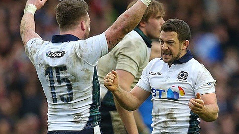 Scotland captain Greig Laidlaw (right) celebrates victory with Stuart Hogg