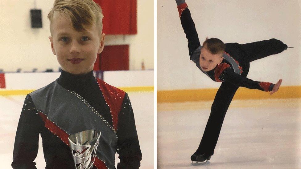 Jayden Orr with trophy and skating