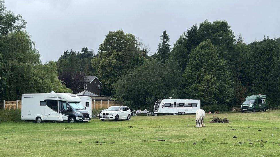 Travellers on the Ilkley Lido site