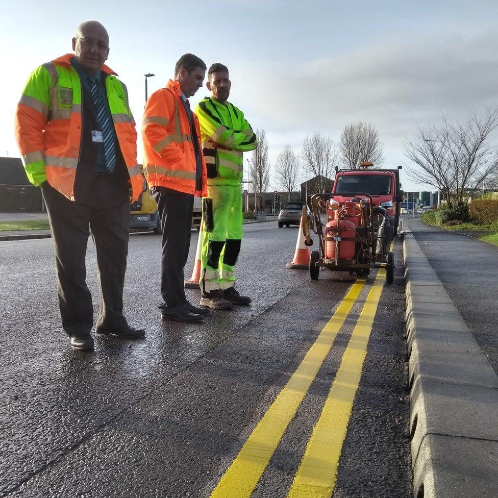 Newport councillor Roger Jeavons inspects yellow lines being painted