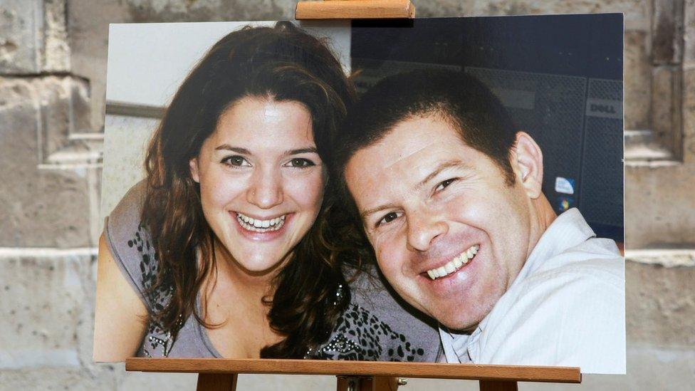 The portraits of French police commander Jean-Baptiste Salvaing (R) and his companion, administrative agent Jessica Schneider are seen at a ceremony in the courtyard at the Interior Ministry in Paris, France, 15 June 2016.