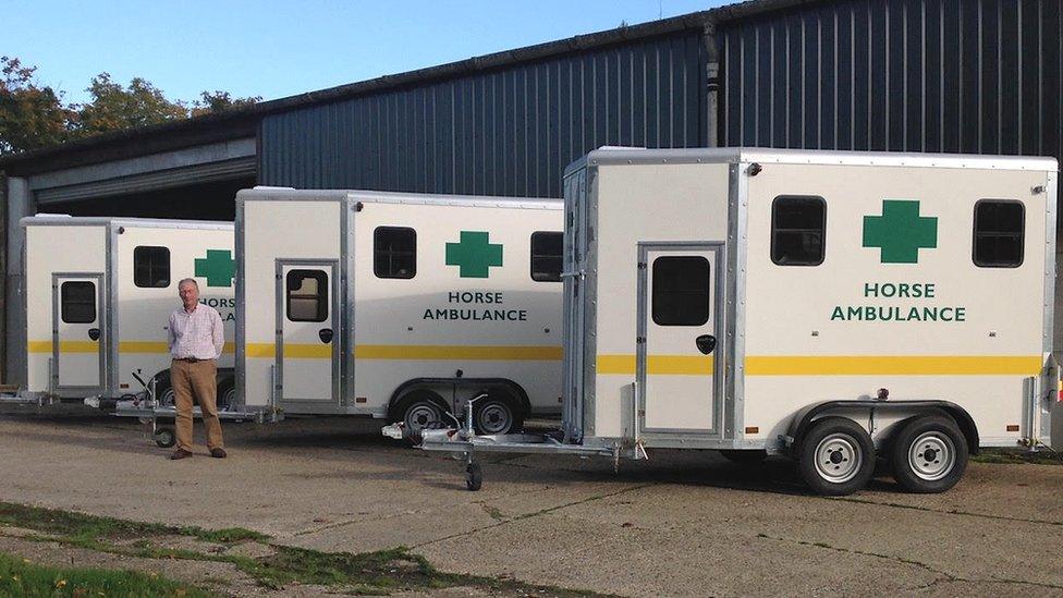 Bill Fellowes of Equisave with three of his horse ambulances