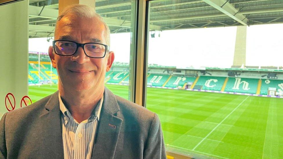 Andy Tresias in a hospitality box overlooking the ground