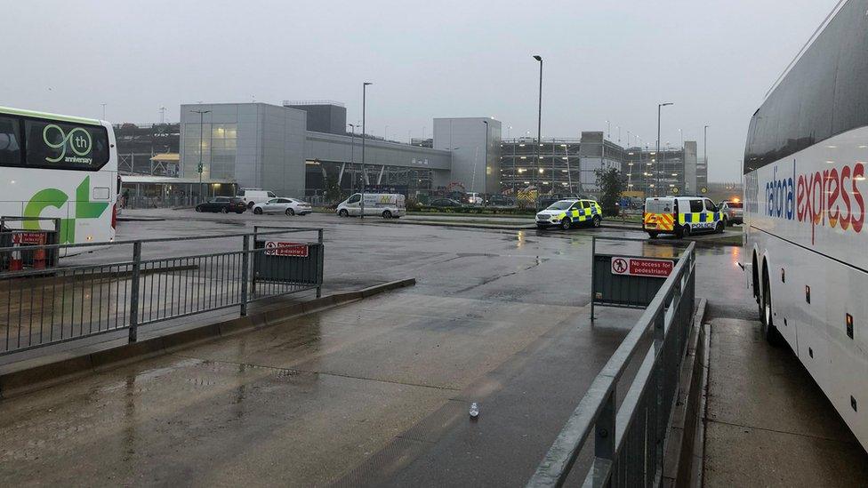 Police vehicles at London Luton Airport