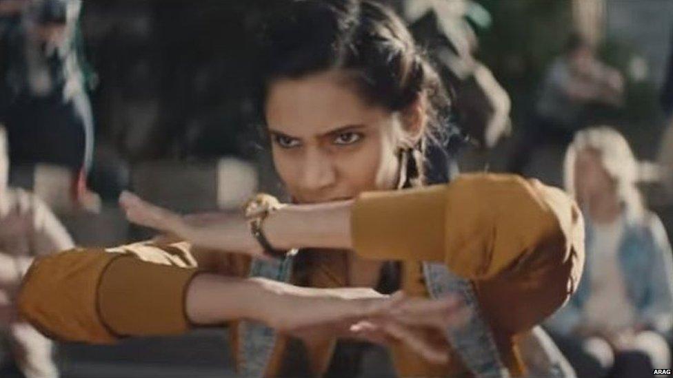 Woman performing haka in ad