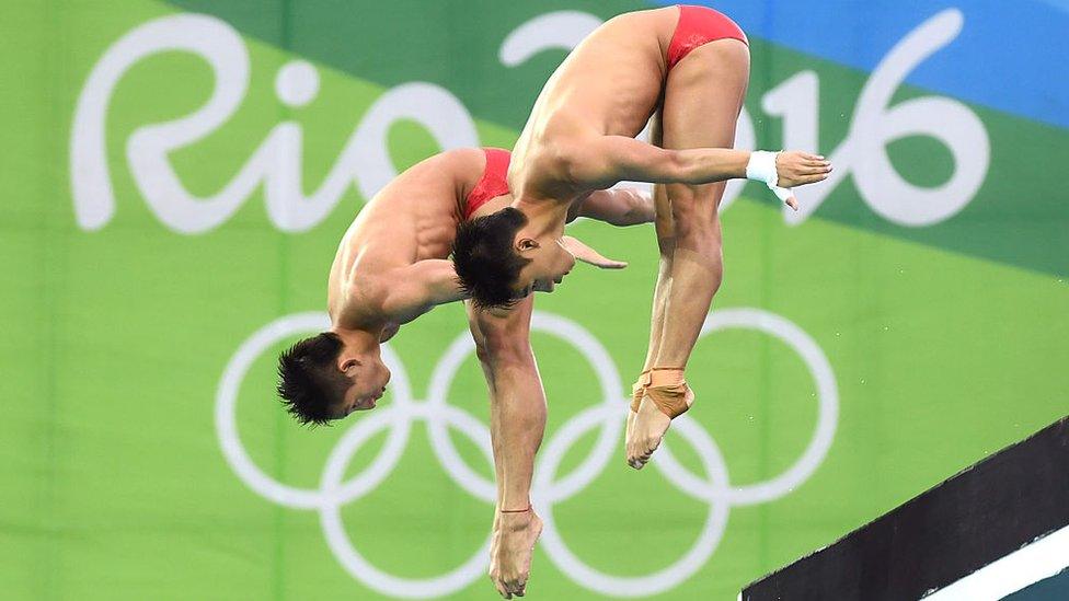 Aisen Chen and Yue Lin of China compete in the Men's Diving Synchronised 10m Platform Final