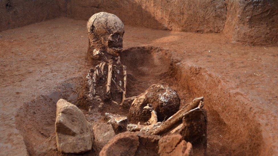 A photo from the Australian National University shows human remains at an ancient burial ground