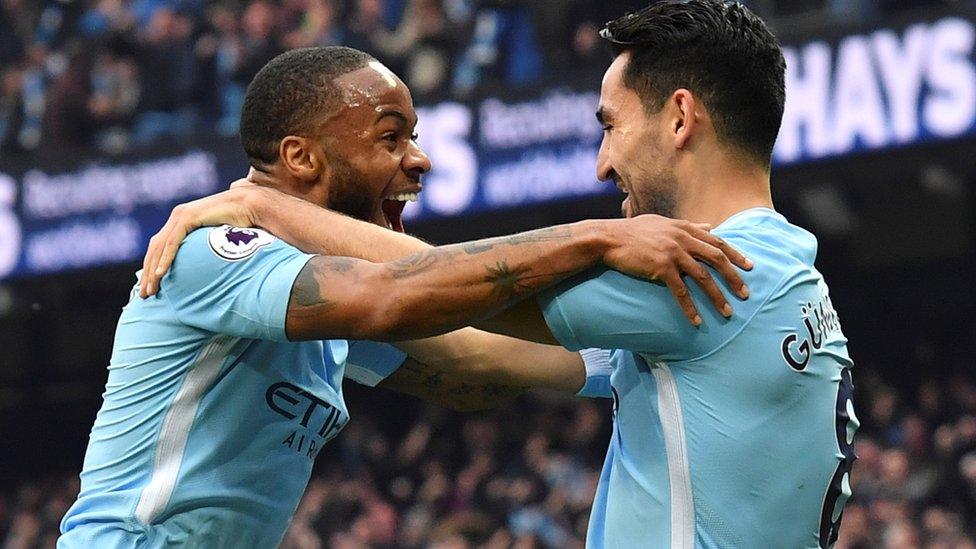 Ilkay Gundogan and Raheem Sterling celebrate