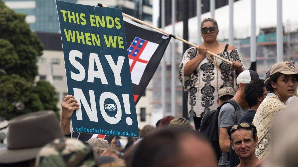 Protesters occupy the grounds around the parliament building in Wellington on February 9, 2022