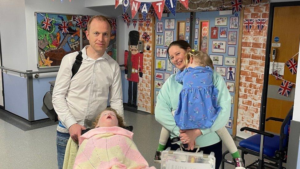 The Treadwell family leaving hospital