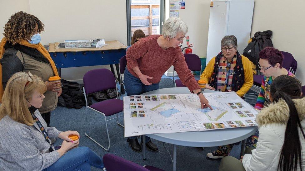 Members of the church community planning the project