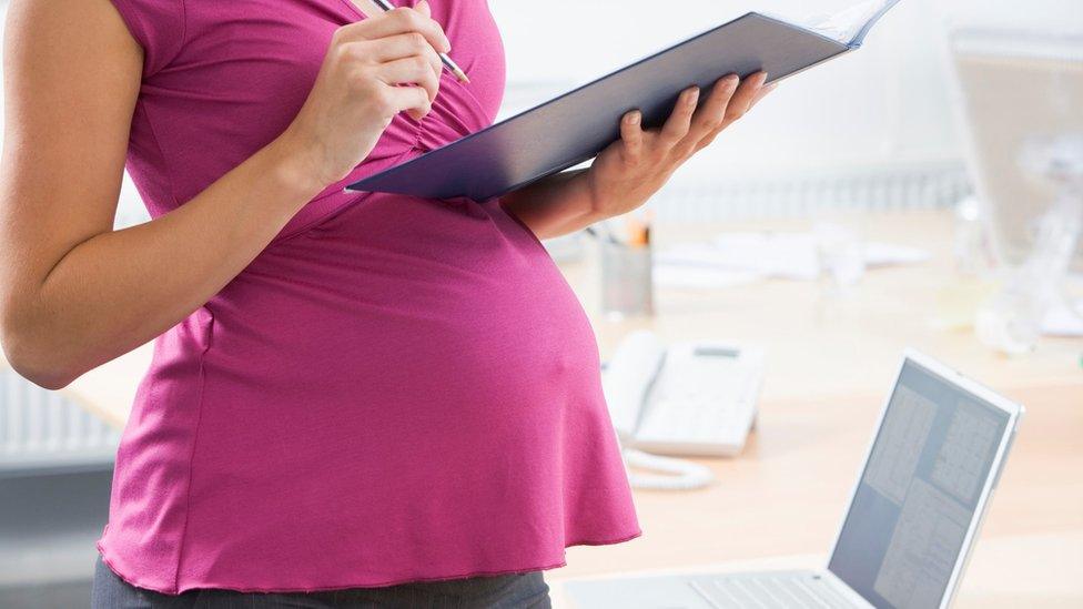 Pregnant woman at work