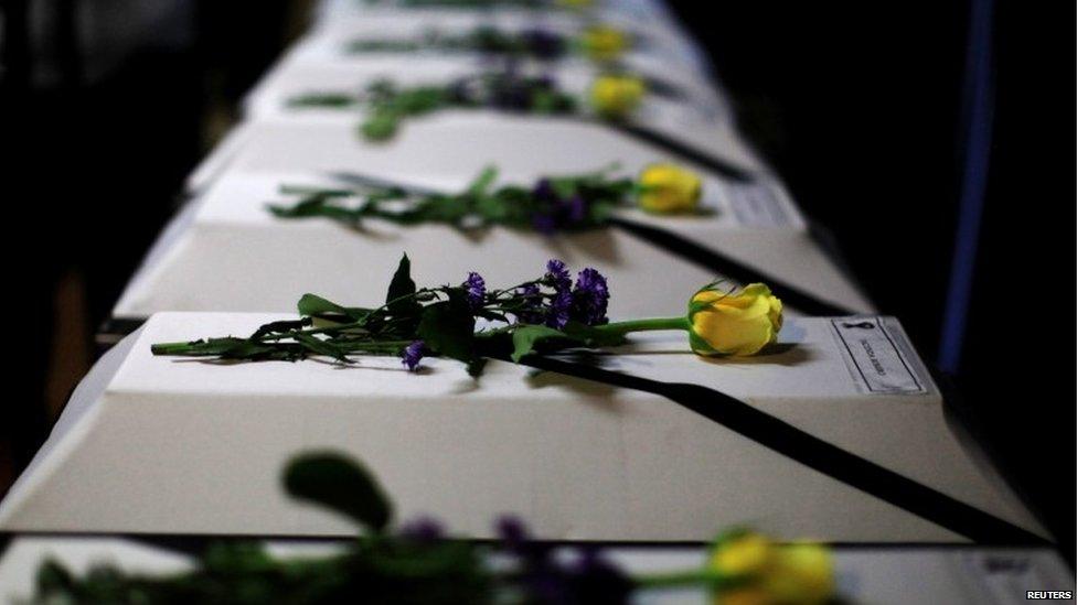 The remains of 11 victims of the El Mozote massacre in 1981 are lined up to be handed over to their relatives (20/05/2016)