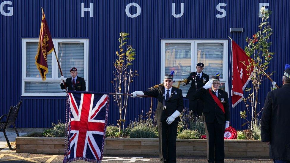 Veterans during an Armistice Day service at Poppyscotland's Lady Haig Poppy Factory in Edinburgh.