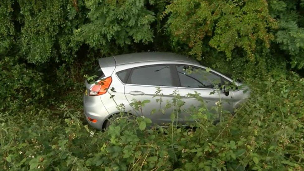 Car in ditch