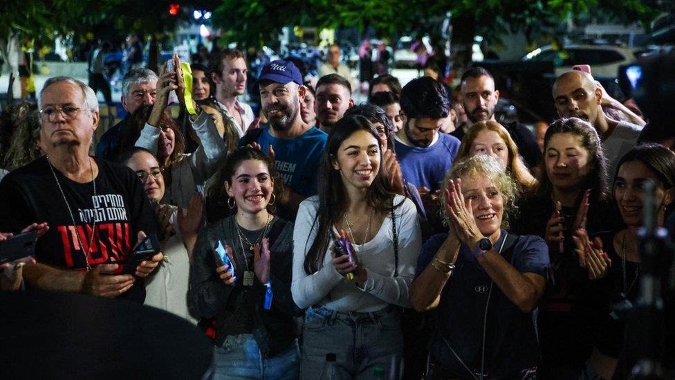 People in Tel Aviv react to news of a deal struck between Hamas and Israel