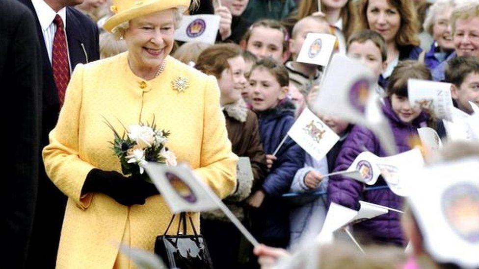 The Queen smiles at some of the many school children that came out to meet her at Duthie Park, Scotland, Tuesday May 28, 2002.