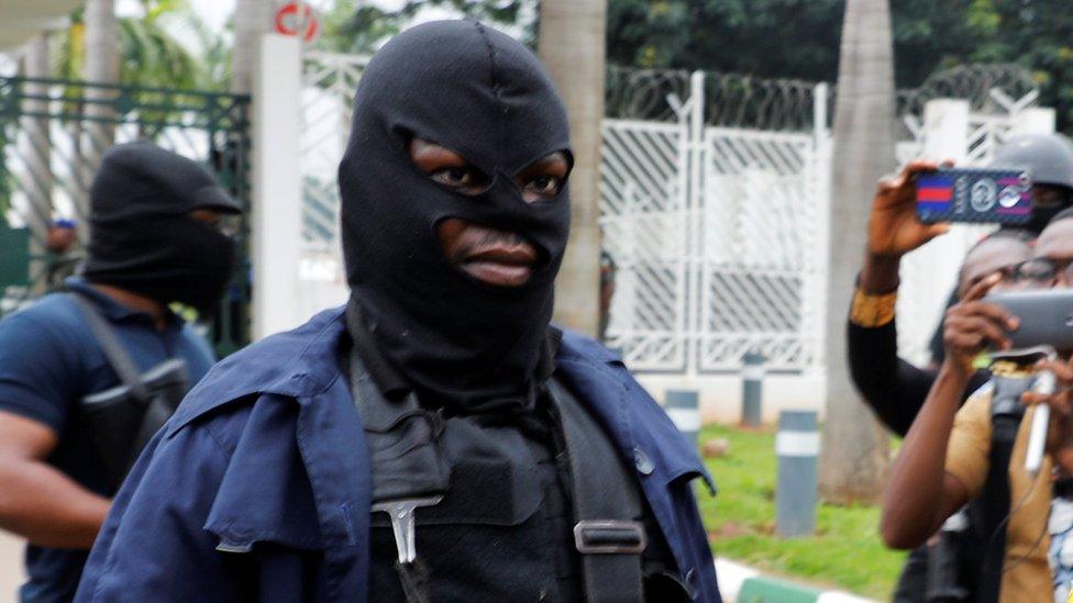 Masked DSS agents at Nigeria's parliament