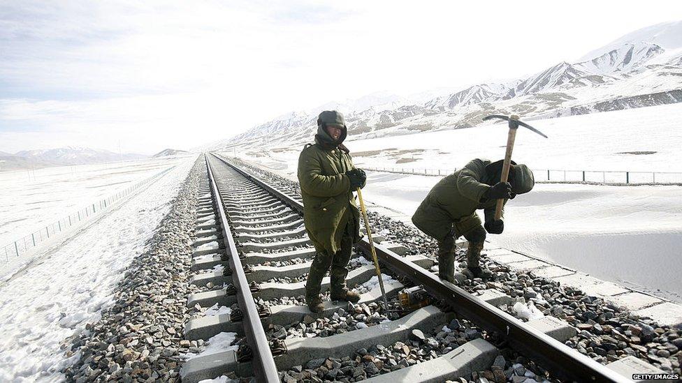 Men building railway