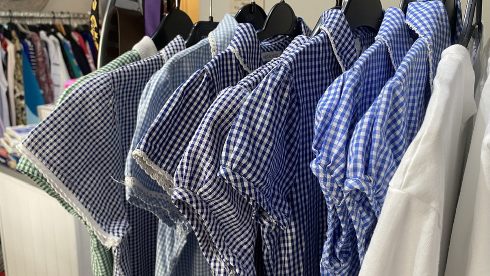 A rack of school uniform summer dress