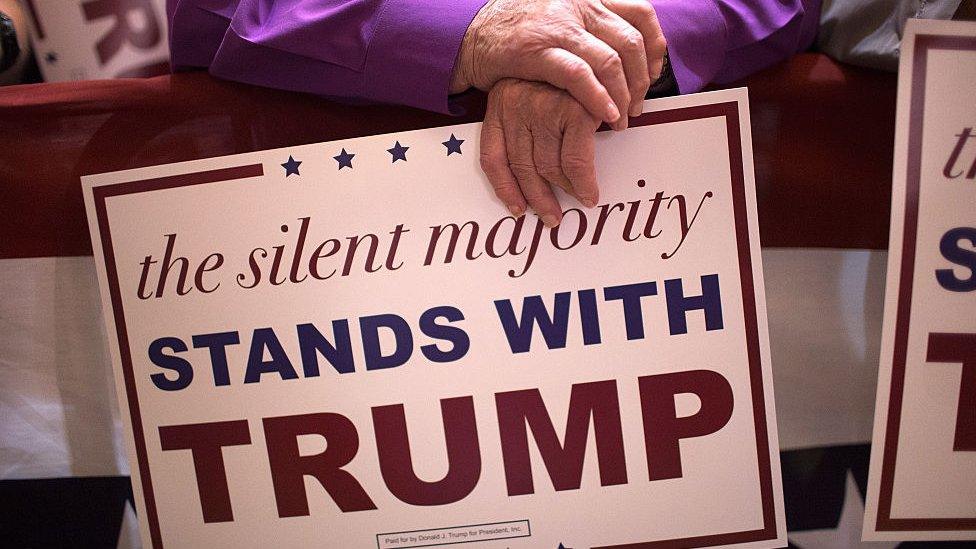 Guests wait for Republican presidential candidate Donald Trump to speak at a campaign rally at Burlington Memorial Auditorium on October 21, 2015 in Burlington, Iowa.