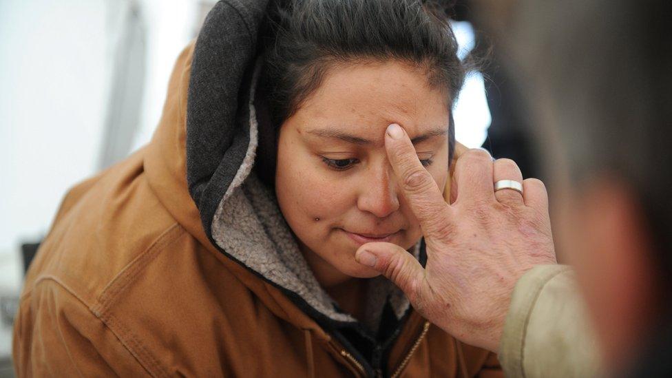 Lady receiving treatment.