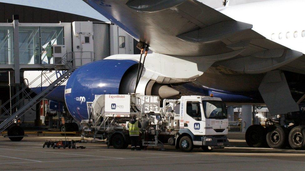 Plane being refuelled