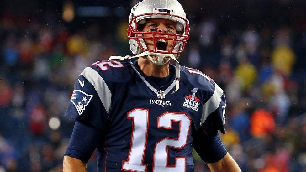 Tom Brady of the New England Patriots cheers as he runs on to the field before the game against the Pittsburgh Steelers at Gillette Stadium on 15 September 2015