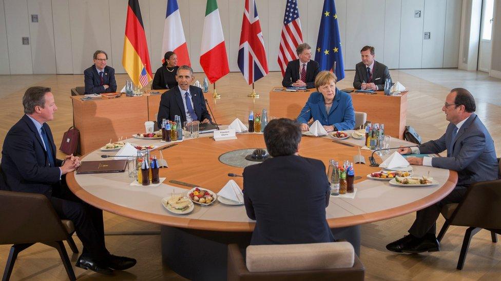 German Chancellor Angela Merkel sits with US President Barack Obama, British Prime Minister David Cameron, Italian Prime Minister Matteo Renzi and French President Francois Hollande before their meeting in Schloss Herrenhausen in Hannover. 25 April 2016