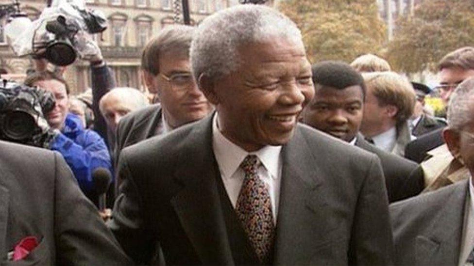 Mandela smiles as he arrives at Glasgow City Chambers in 1993