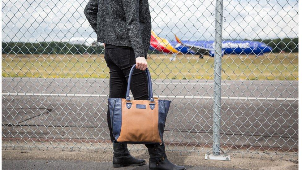 A handbag upcycled from airplane seat leather