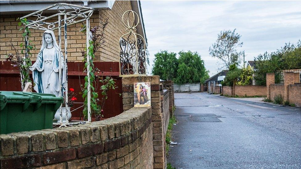 Religious artefacts outside people's homes