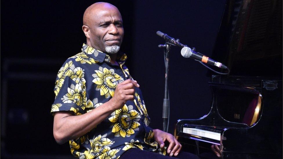 Congolese musician Ray Lema perform on March 9 at the palais de la culture in Abidjan during the 9th edition of the Market For African Performing Arts (MASA) festiva